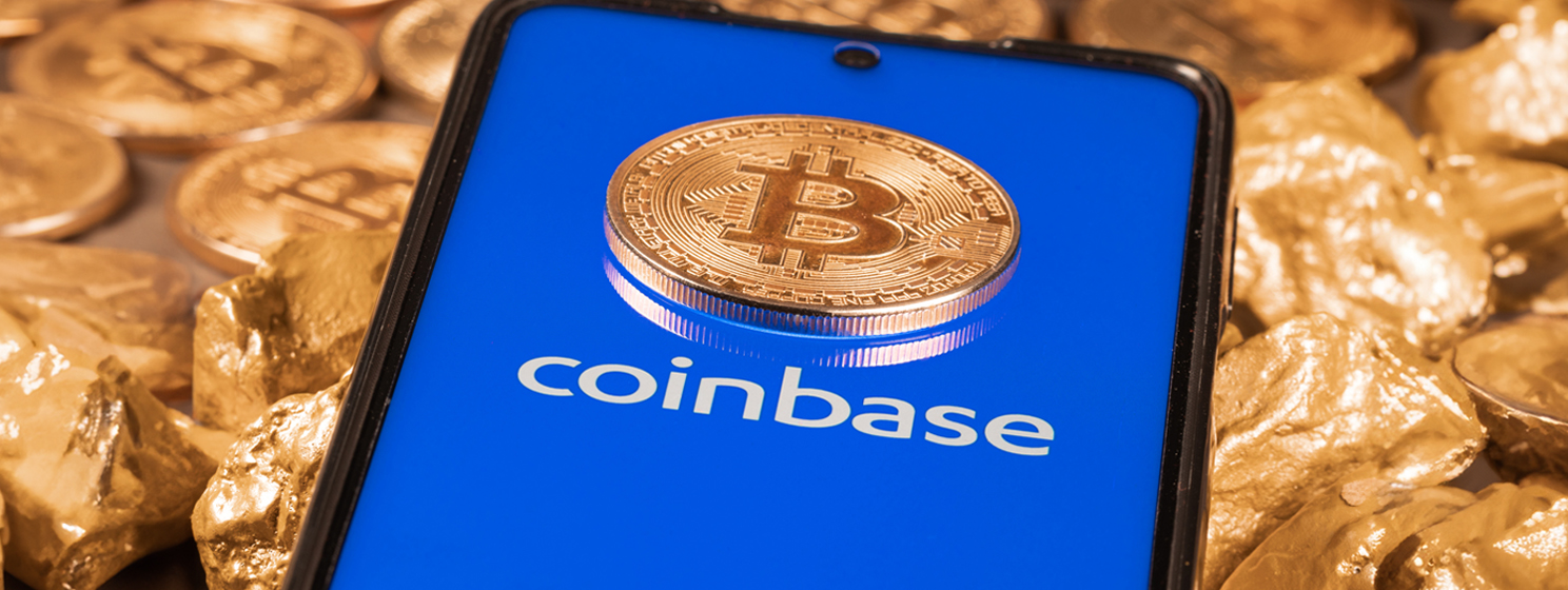 Coinbase logo with BTC coin and gold