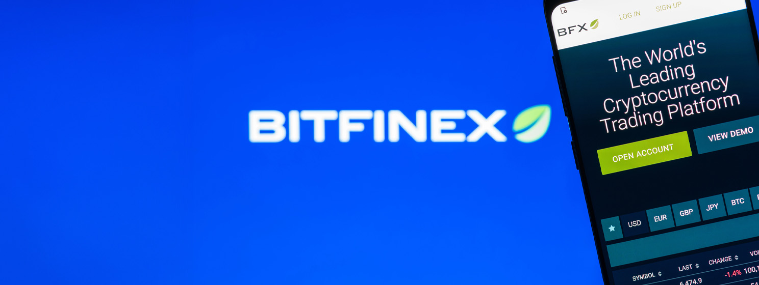 Bitfinex logo and app on a mobile phone