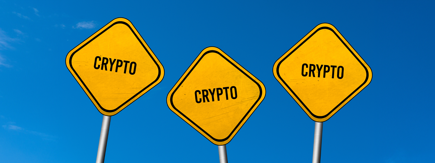 Crypto signages over blue sky background