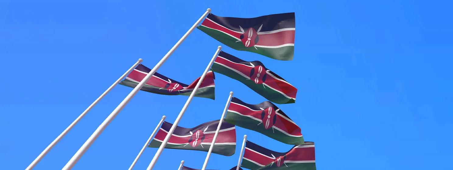 Kenya flags over sky background