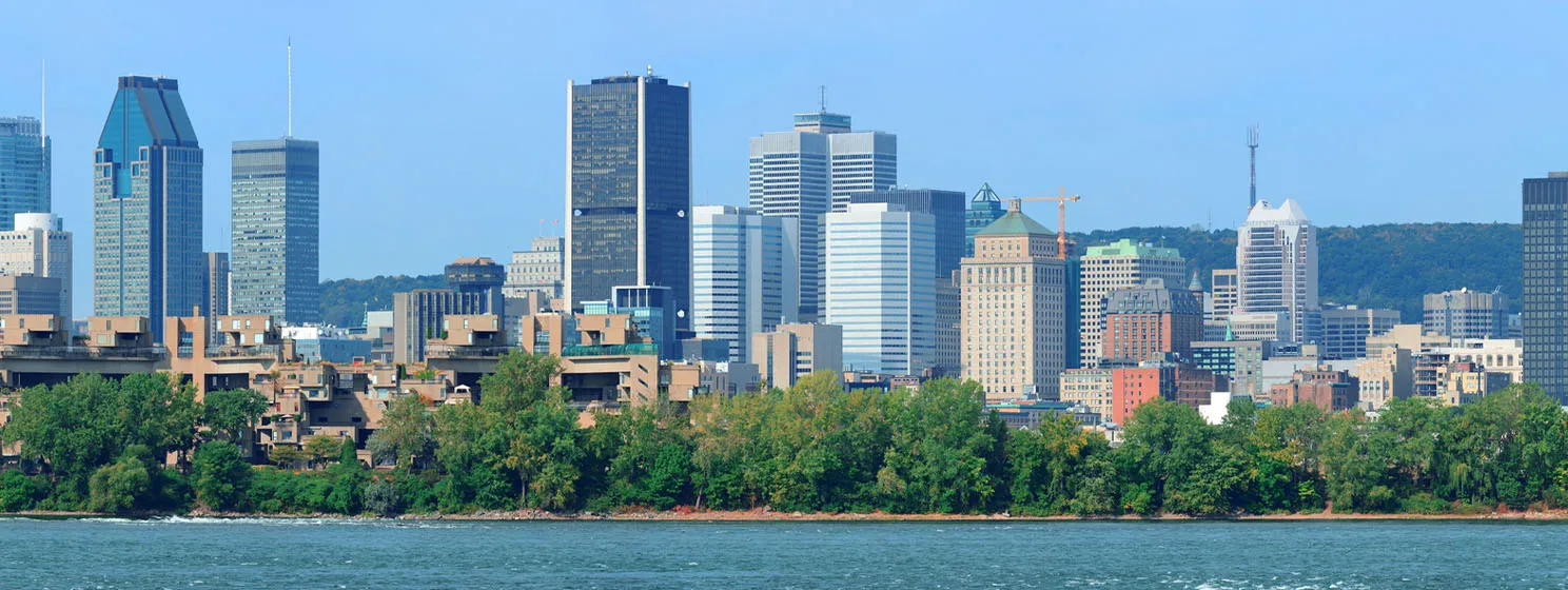 Montreal city skyline over river panorama