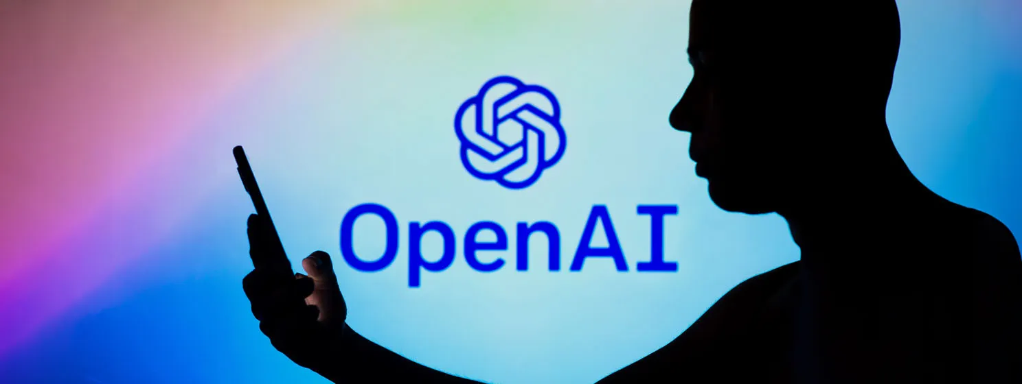 OpenAI logo with a shadow of a man