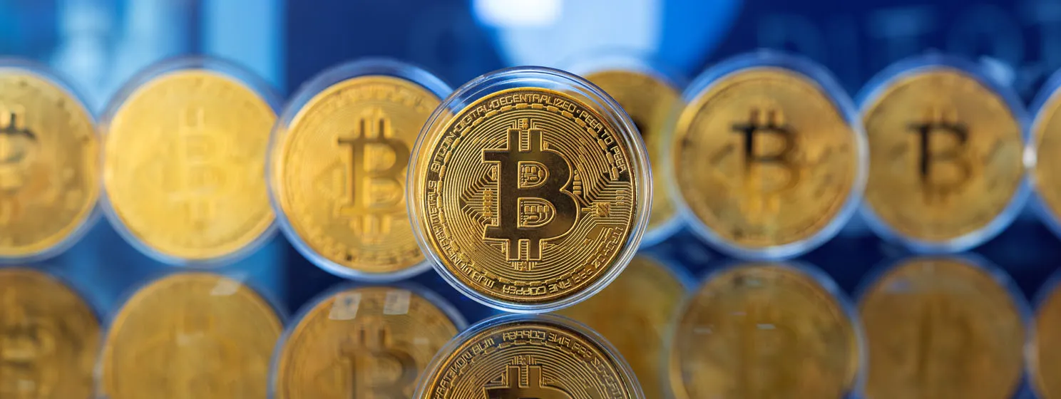Cryptocurrency concept with several bitcoin coins