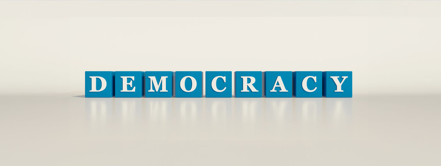 Democracy blue letter blocks