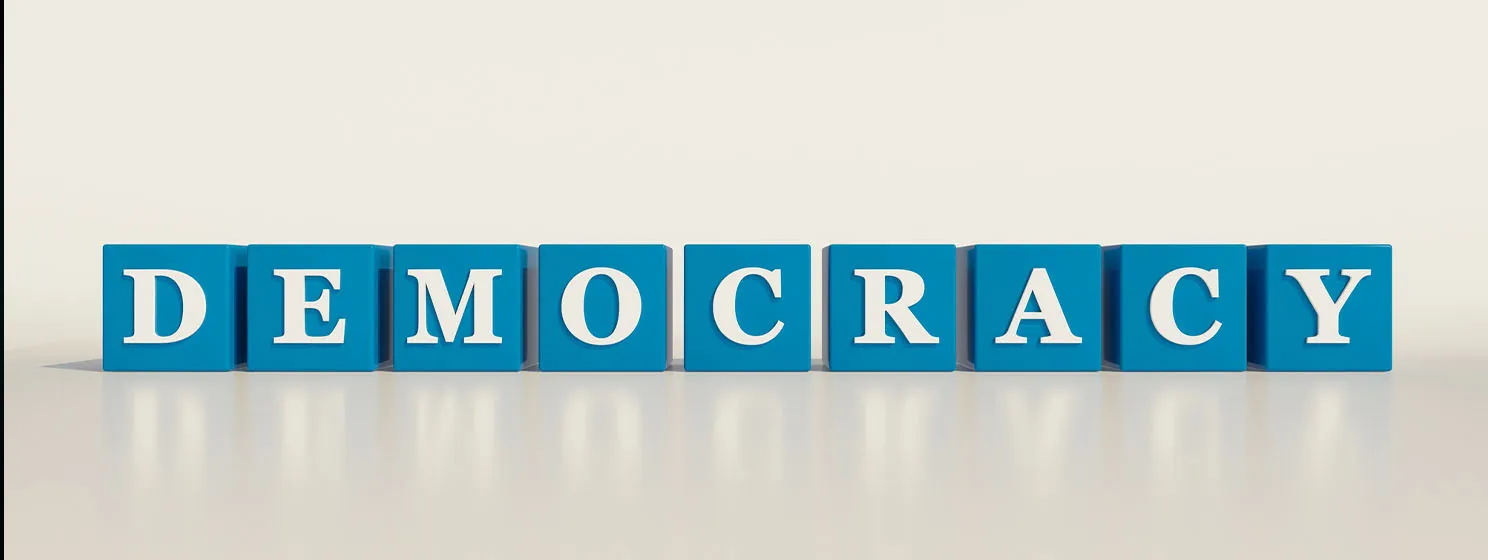 Democracy blue letter blocks