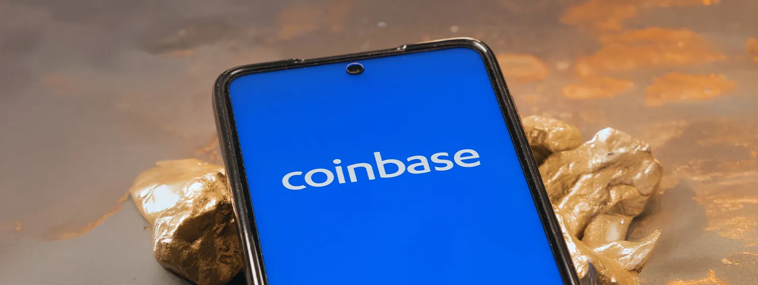 Coinbase logo and Bitcoins