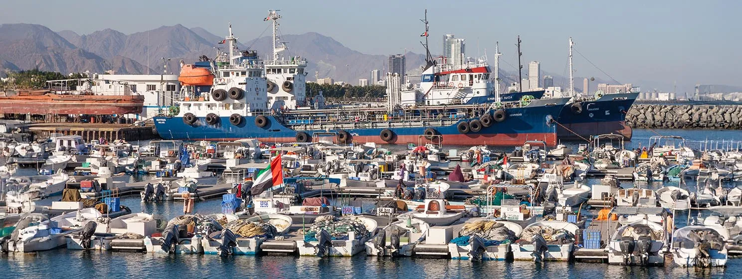Boats and ships in the fishing port of Kalba. December 14, 2014 in Fujairah, United Arab Emirates.