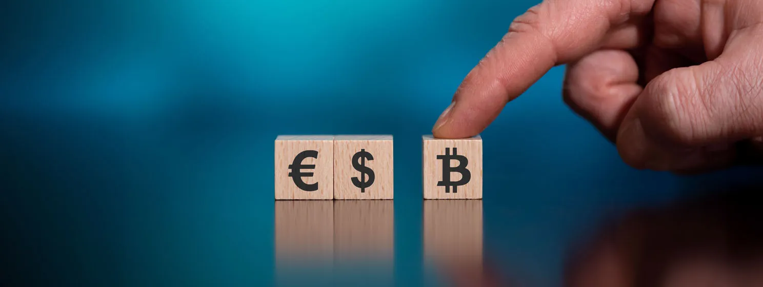 Currencies on wooden cubes
