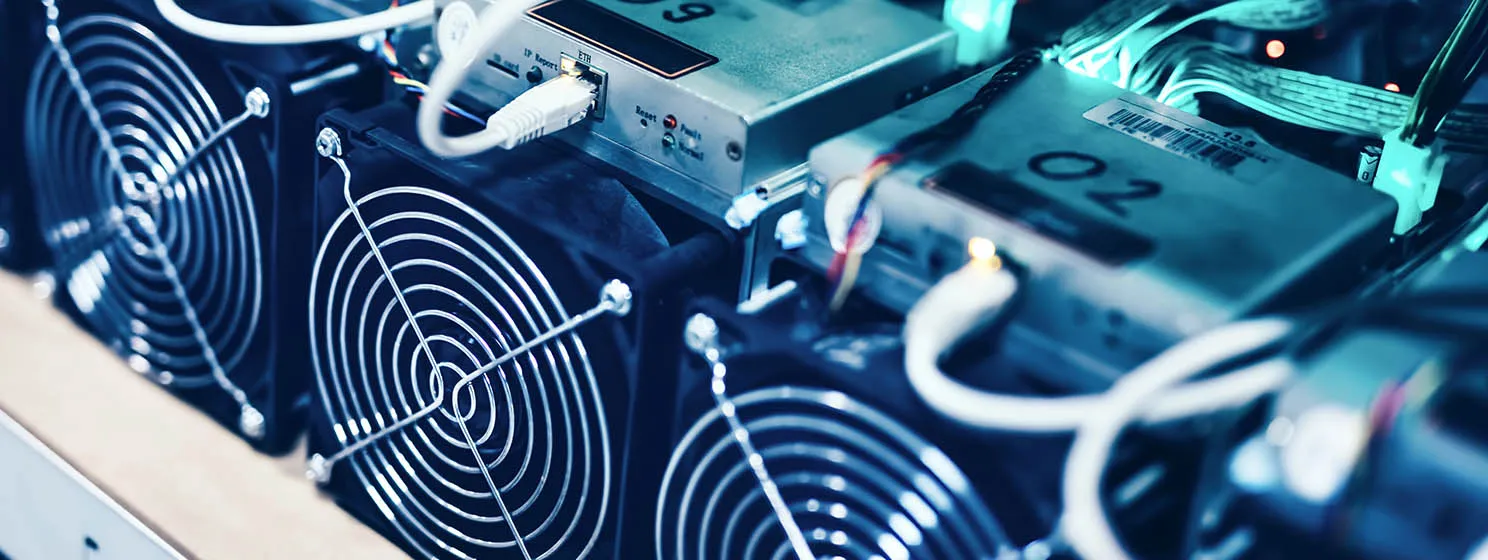 Bitcoin and crypto mining computer machines in a big data center. High tech servers at work.