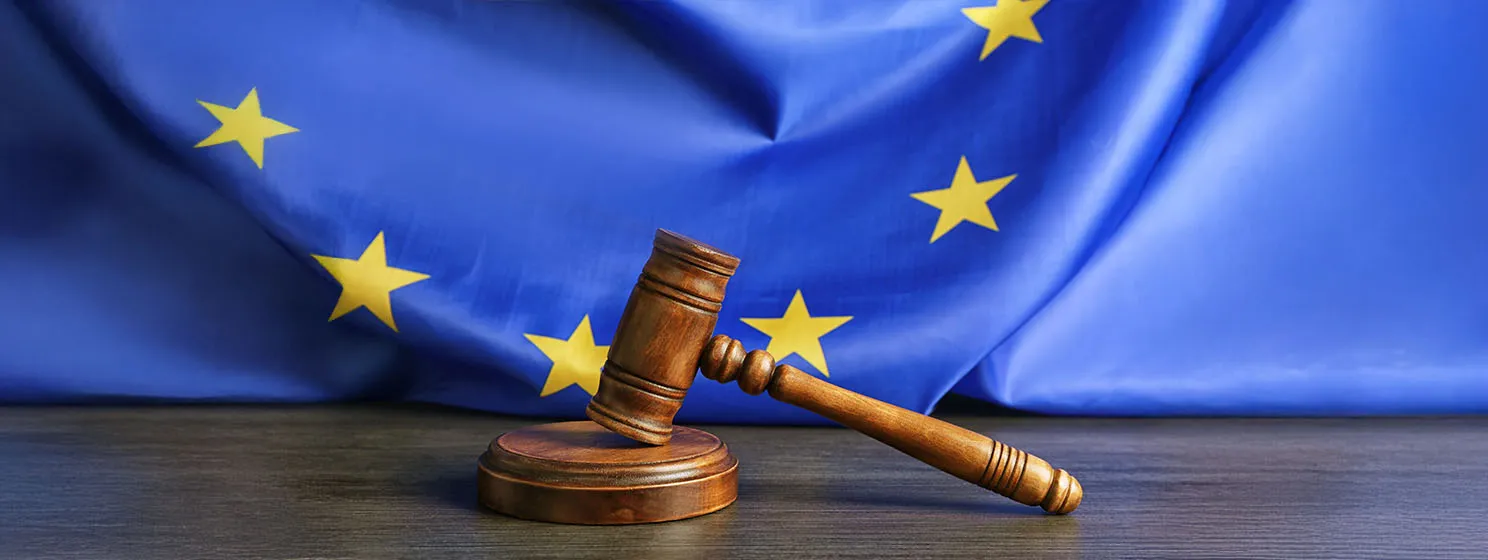Judge gavel on European Union flag.