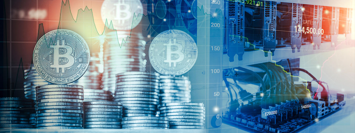 Computer for Bitcoin mining and bitcoin coin on a stock market charts
