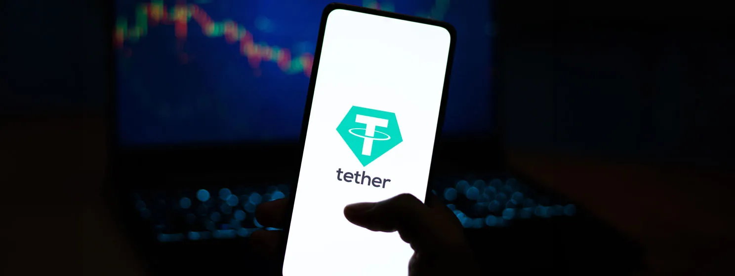 Tether logo on phone screen stock image