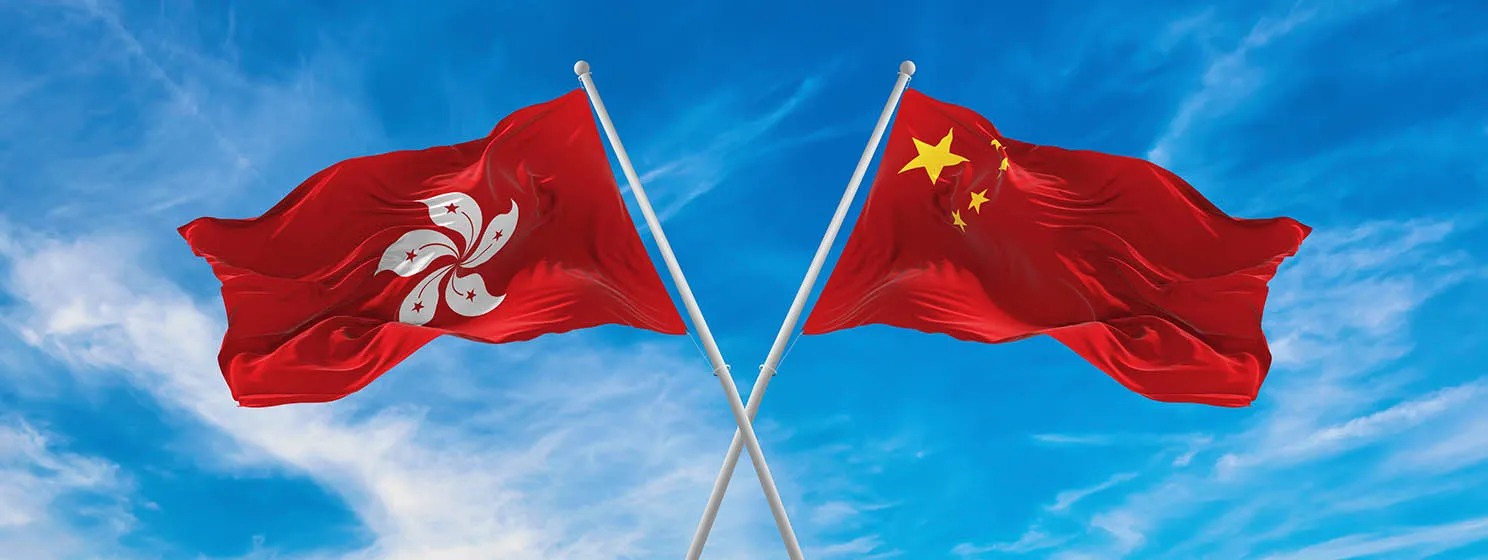 Remove BG Save Share Sample Flags of China and Hong Kong waving in the wind.