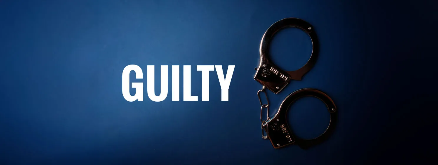 hand cuff with text GUILTY on a blue background