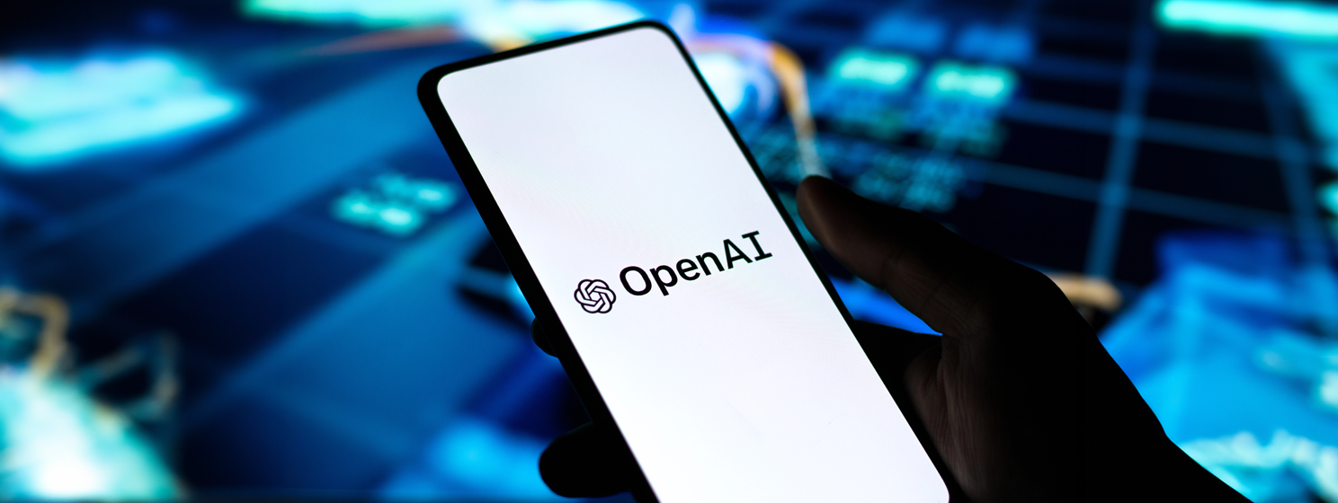 OpenAI logo on phone screen