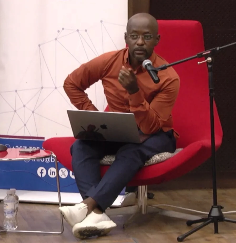 Mukom Tamon at the Africa IPv6 Cybersecurity Secure Tech Summit 2025 stage.
