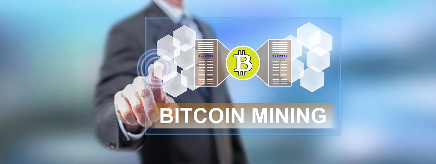 Man touching a bitcoin mining concept on a touch screen with his fingers.