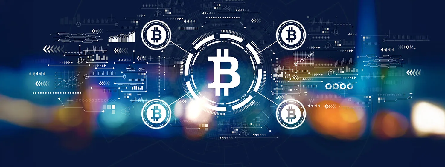 Bitcoin technology theme with blurred city lights at night.