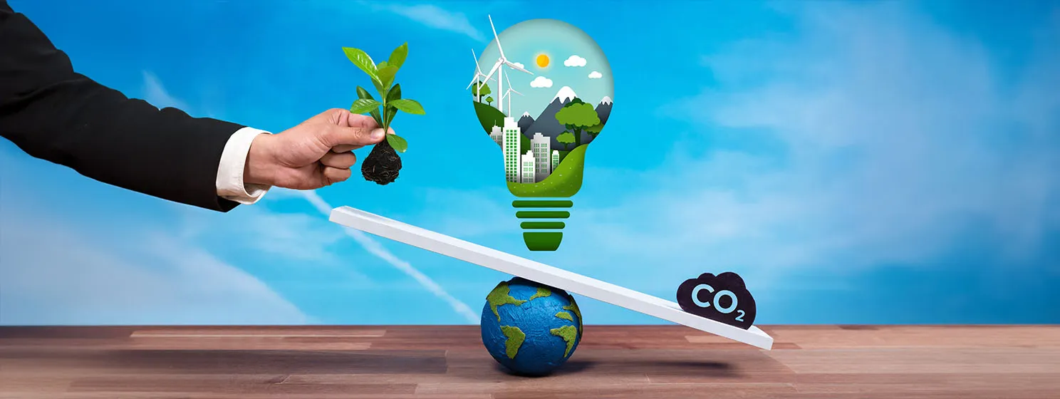 Businessman balance light bulb on scale with CO2 emission icon, demonstrate ESG commitment and environmental conservative idea to carbon reduction through clean energy technology.