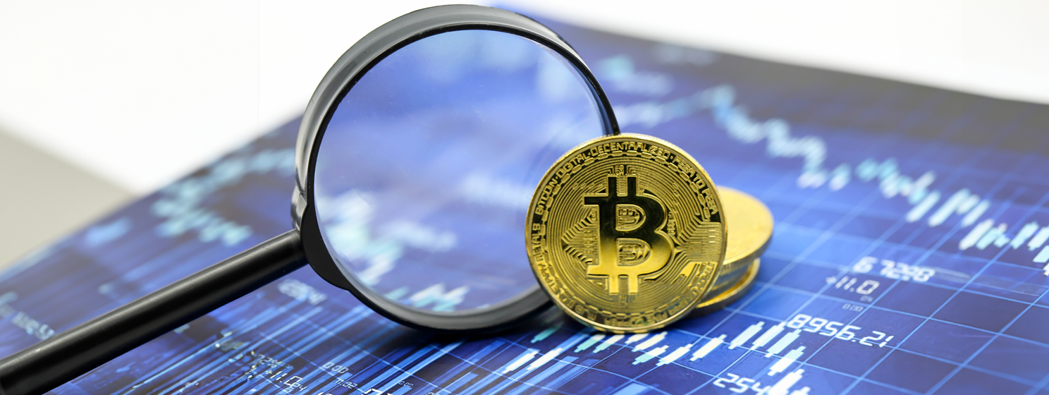 Magnifying glass of bitcoin graph chart