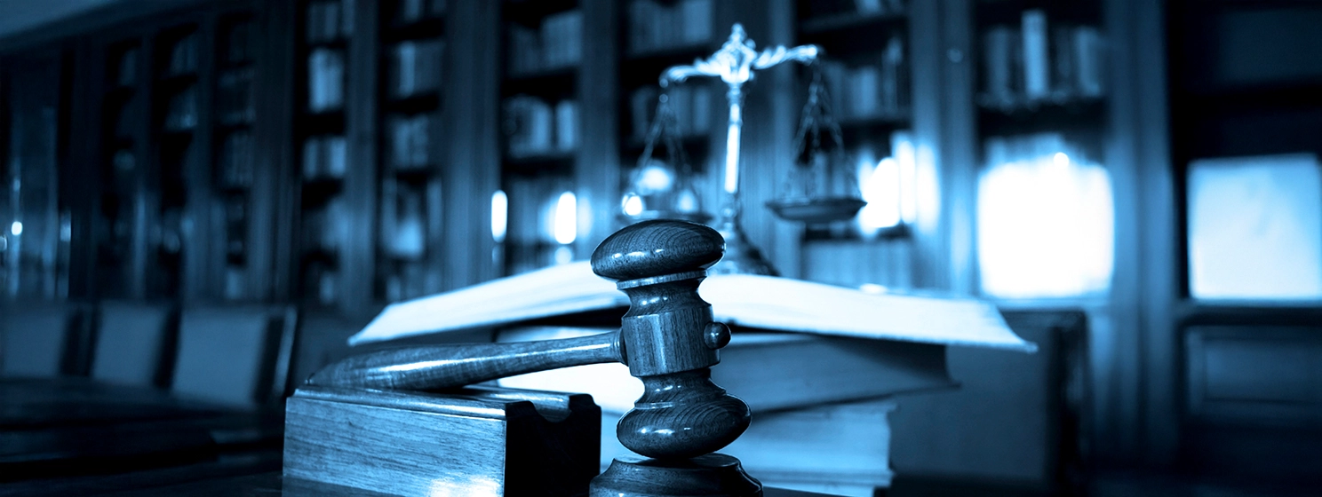 Court room and a judge's gavel on the table.
