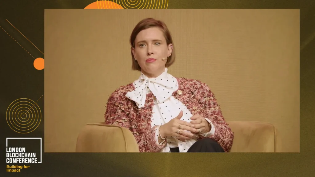 Emma Lovett, Executive Director of JP Morgan Chase at the London Blockchain Conference 2025 stage.