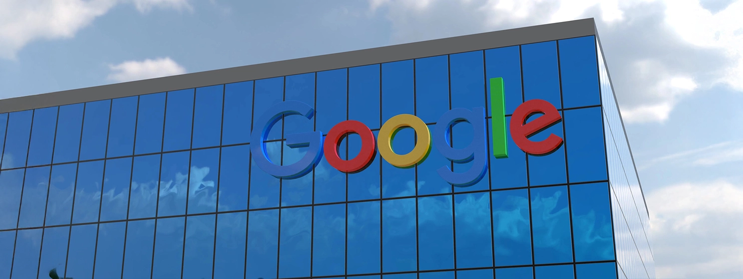 Google This captivating 4K footage captures the iconic corporate logo of a well-known company displayed on the facade of a stunning glass building.