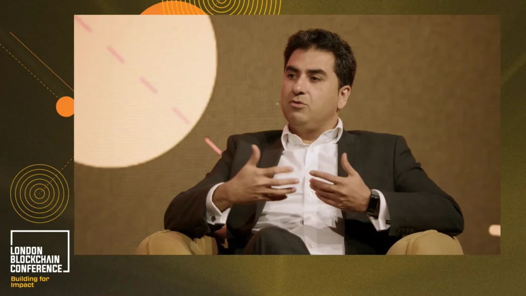 Sabih Behzad, Head of Digital Assets and Currencies Transformation at Deutsche Bank speaking at the London Blockchain Conference 2025 stage.
