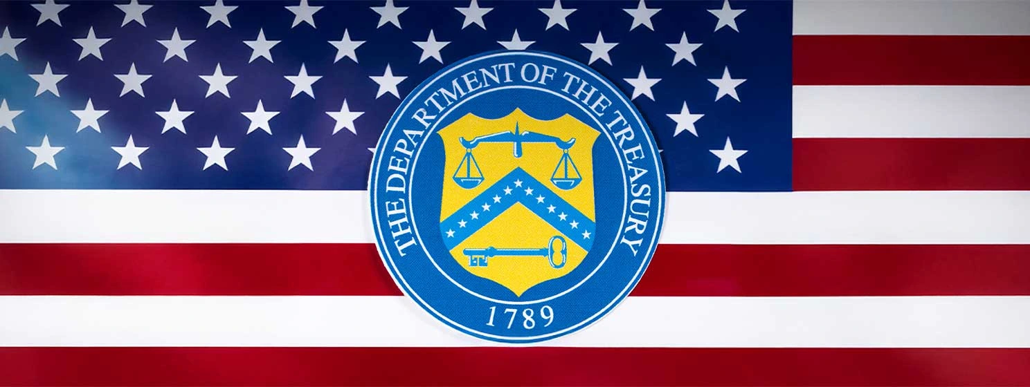United States Department of the Treasury logo with US flag background