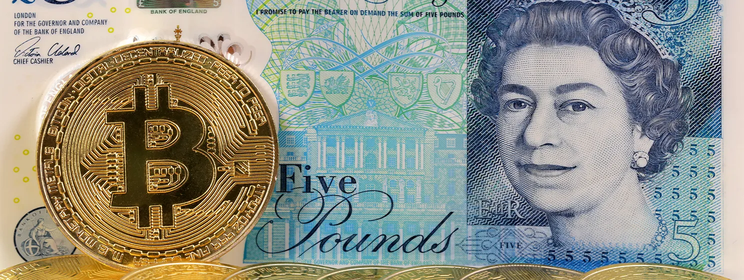 five pound bill and bitcoin coins banner