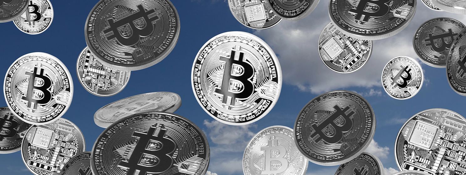 silver bitcoins falling from the sky