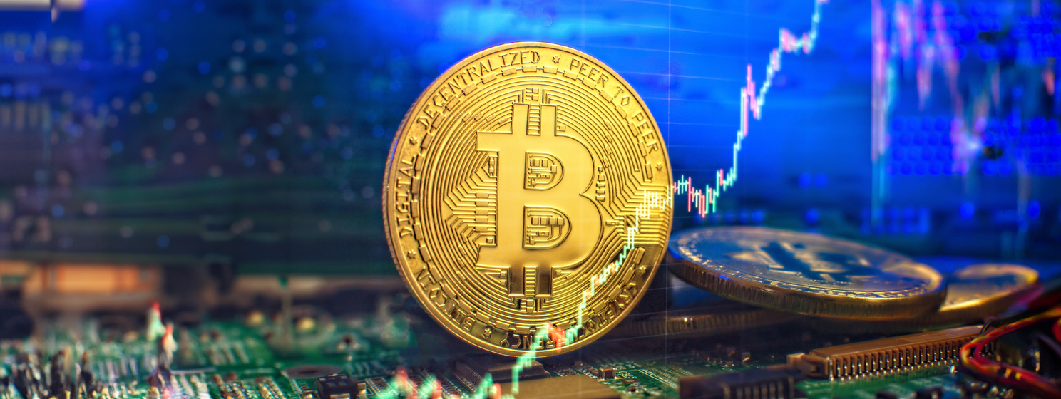 Golden bitcoin on mainboard concept banner