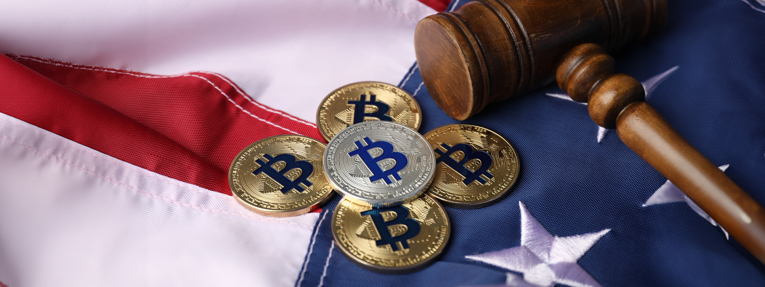 Bitcoins and judge's gavel on American flag banner